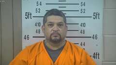 Mugshot of MORA, JOHN