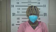 Mugshot of SAM, ROXANNE