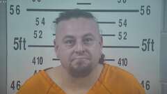 Mugshot of TACKETT, JASON